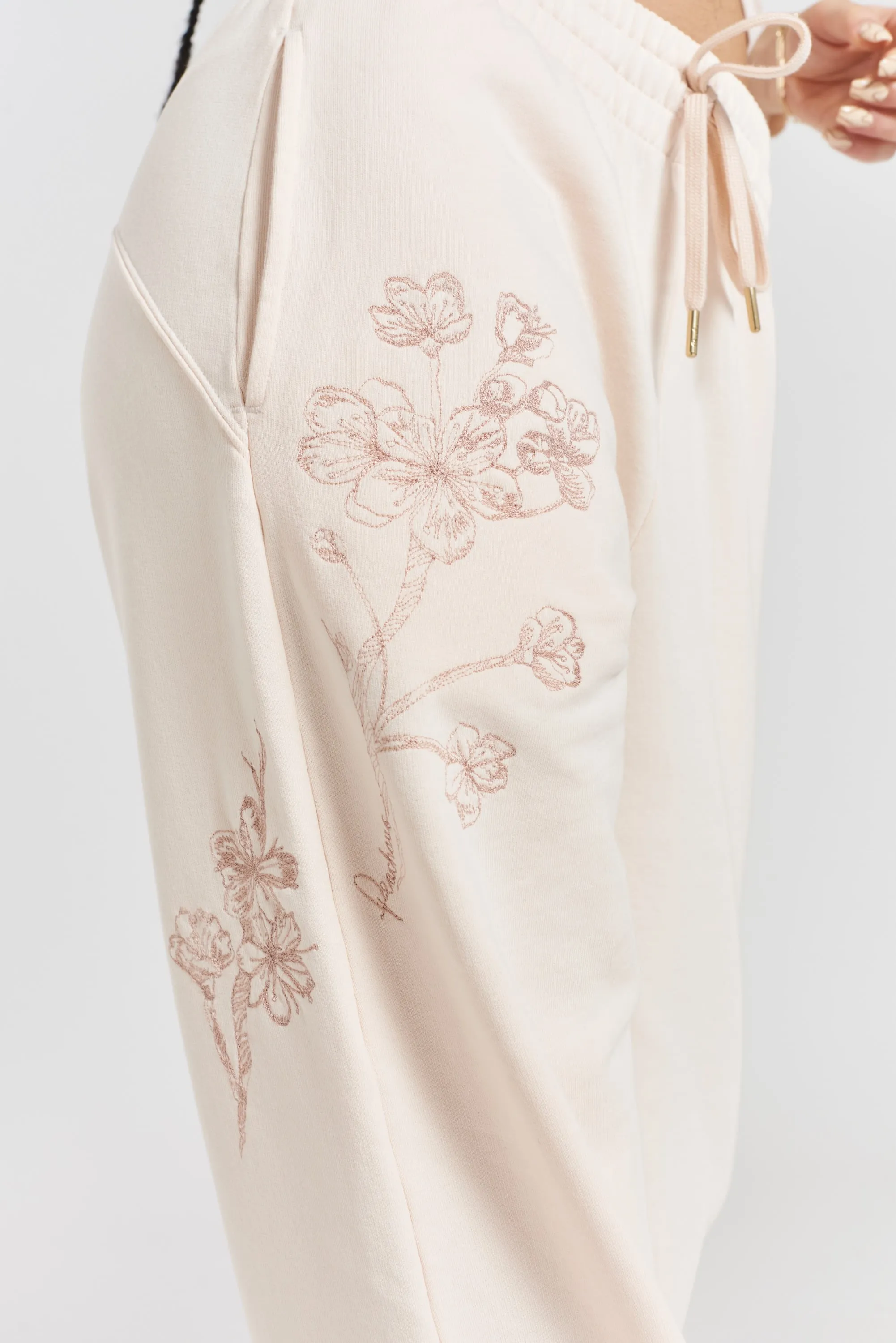 Sitka blossom-embroidered cotton joggers - Shoreline Peach