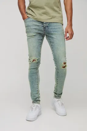 Super Skinny All Over Ripped Blue Washed Jeans