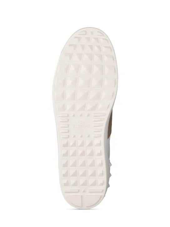 Valentino Garavani   Open leather low top sneakers 