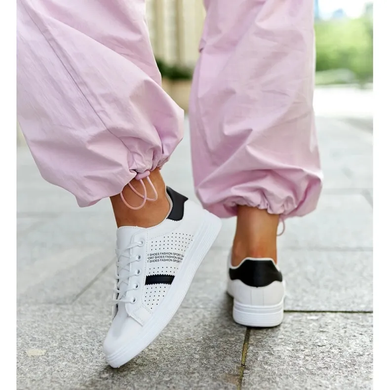 White and black eco leather sneakers by Berdine