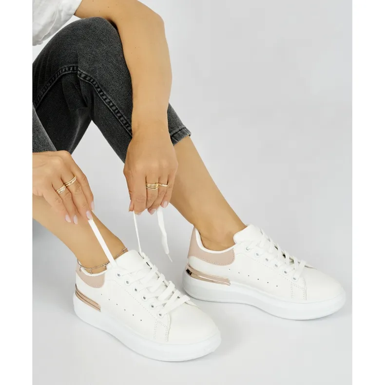 Women's white leather sneakers with a pink element